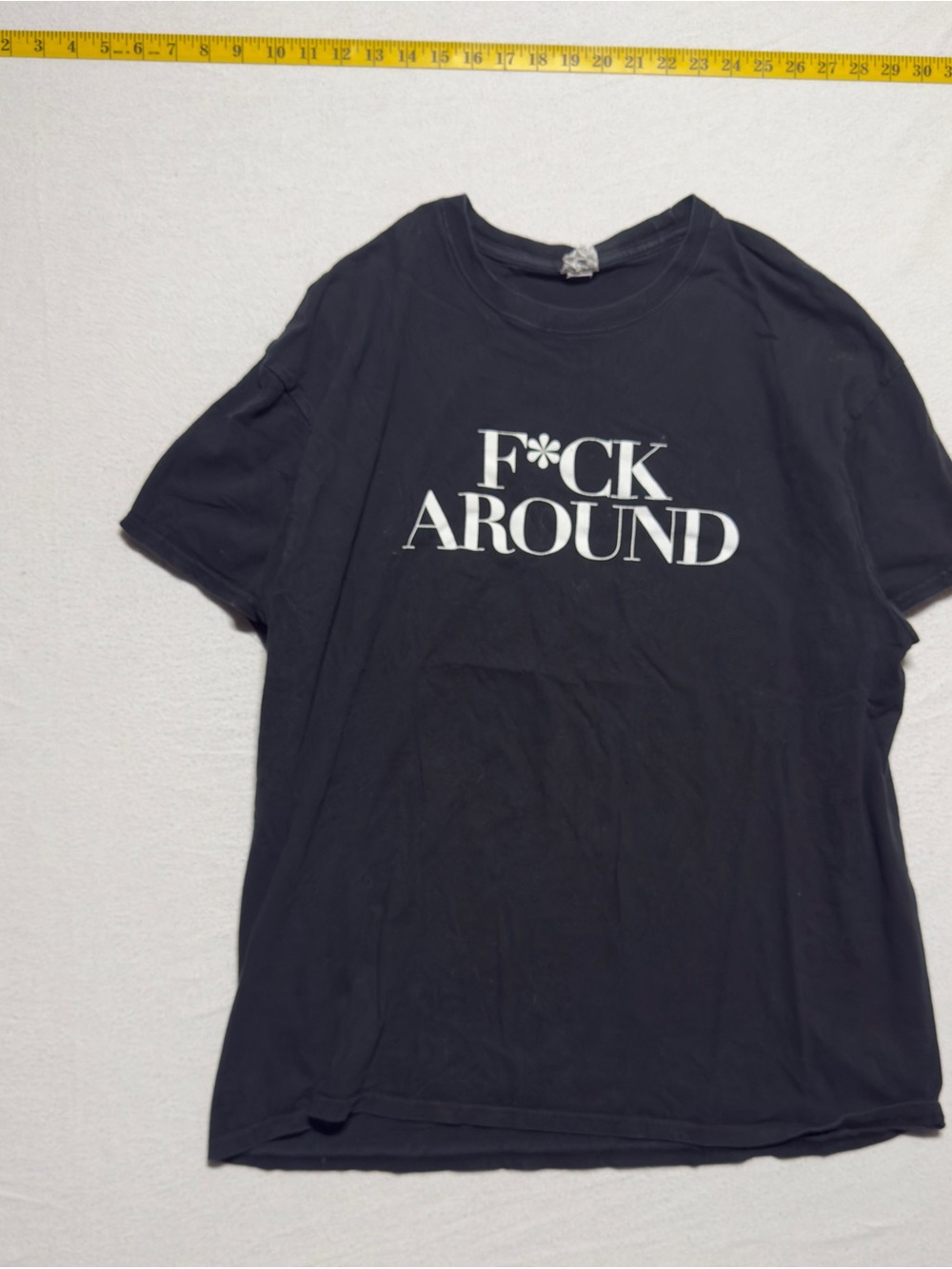 Men's Black Graphic Short-Sleeve Tee with Bold White Text